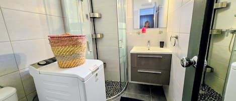 Shower, towels, toilet paper