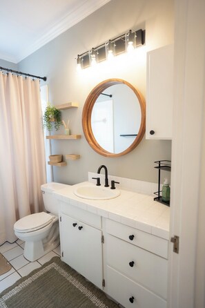 Hair dryer, towels, soap, shampoo