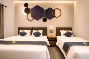Deluxe Triple Room, Non Smoking | Blackout drapes, iron/ironing board, free WiFi - Casananta Seminyak (Seminyak)