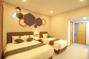 Deluxe Triple Room, Non Smoking | Blackout drapes, iron/ironing board, free WiFi - Casananta Seminyak (Seminyak)