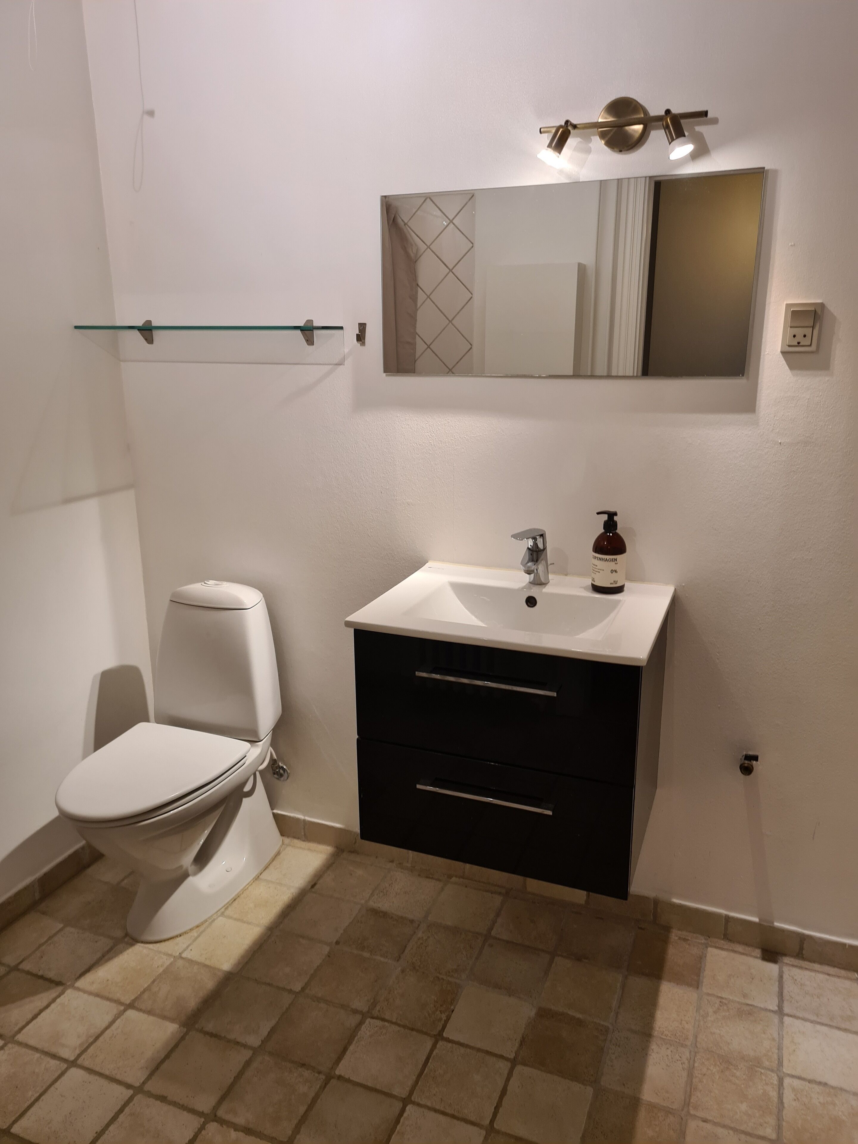 Exklusiv svit - utsikt mot staden | Badrum | Dusch, handdukar, tvål och schampo