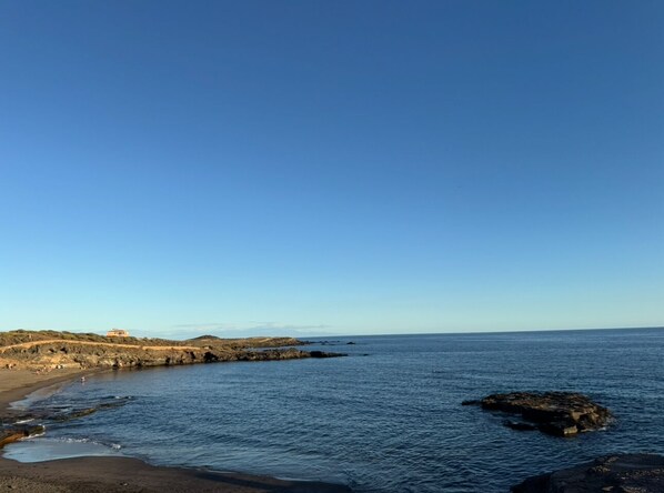 On the beach, sun loungers