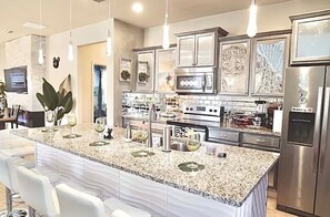 Fridge, microwave, oven, stovetop - Themed Villa with Heated Pool & Theater (Kissimmee)