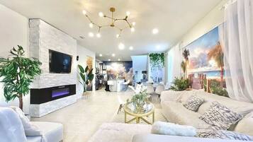 Smart TV, fireplace, video games, foosball