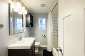 Hair dryer, towels, soap, toilet paper