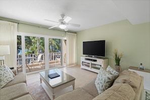 Deluxe Condo, 2 Bedrooms, Ocean View | Living area | 55-inch Smart TV with digital channels, Netflix, streaming services - London House Seven Mile Beach Cayman (Seven Mile Beach)