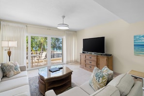 Deluxe Condo, 2 Bedrooms, Ocean View | Living area | 55-inch Smart TV with digital channels, Netflix, streaming services - London House Seven Mile Beach Cayman (Seven Mile Beach)