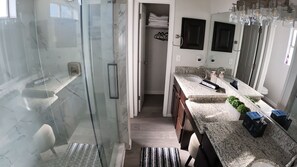 Shower, hair dryer, towels, soap
