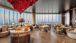 A spacious hotel lobby with a central island, multiple seating areas, and large windows offering city views. - Oryard Hotel Changsha Juzhou (Changsha)