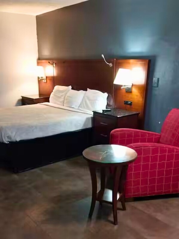 Tabla de planchar con plancha, wifi gratis y ropa de cama 