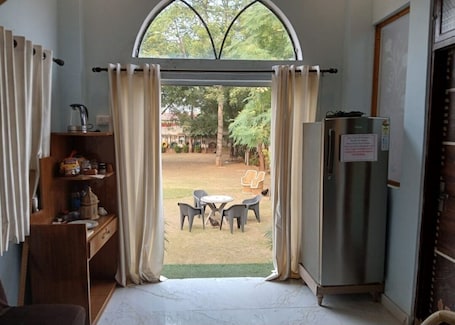 Interior. Cozy 1-bedroom farmhouse in perfect Jaipur with AC. Safe, Serene, Pet Friendly