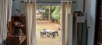 Cozy 1-bedroom farmhouse in perfect Jaipur with AC. Safe, Serene, Pet Friendly