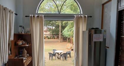 Cozy 1-bedroom farmhouse in perfect Jaipur with AC. Safe, Serene, Pet Friendly