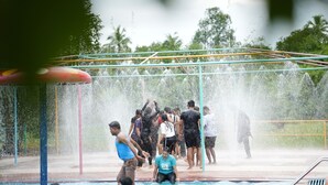 A water park with a pool and water play structures. - Nivant Agro Experience (Vada)