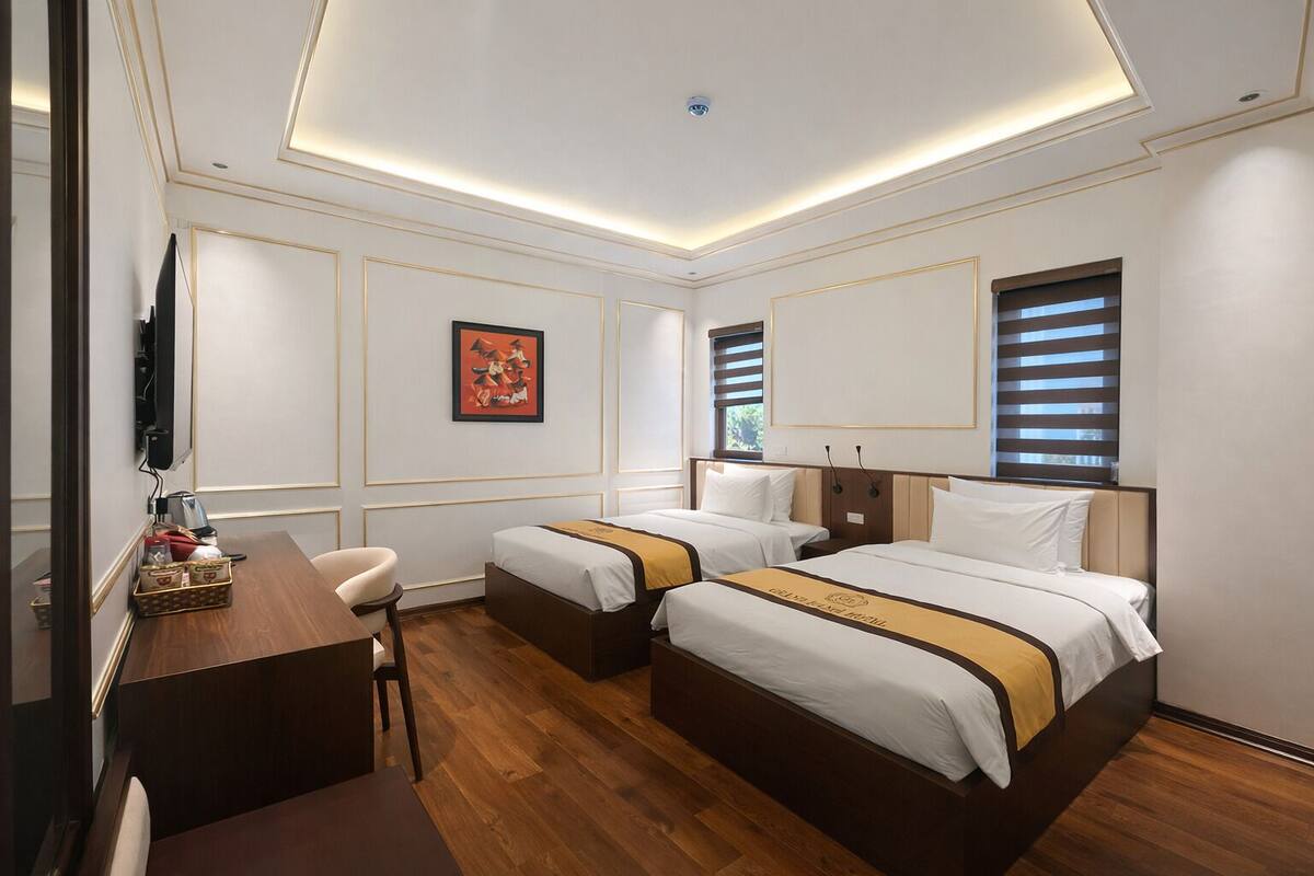 Quarto duplo luxo | Escrivaninha, Wi-Fi de cortesia, roupa de cama