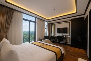 Habitación doble Deluxe | Escritorio, wifi gratis y ropa de cama