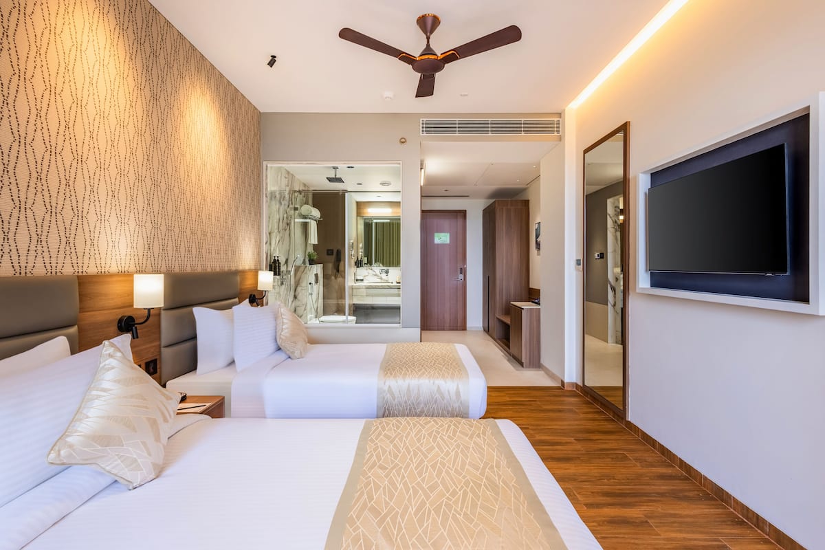 Chambre Exécutive Double ou avec lits jumeaux, balcon | Bureau, Wi-Fi gratuit