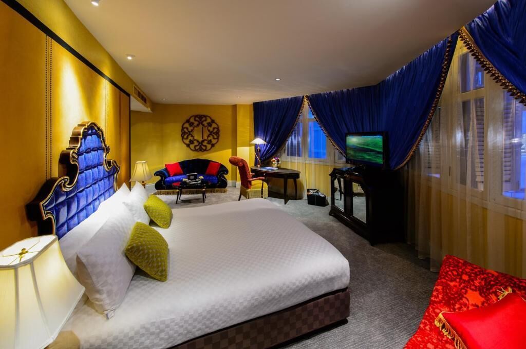 Exclusive Suite, Balcony, City View | In-room safe, desk, laptop workspace, iron/ironing board