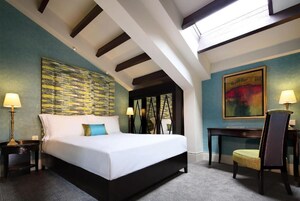 Deluxe Room, Non Smoking | In-room safe, desk, laptop workspace, iron/ironing board