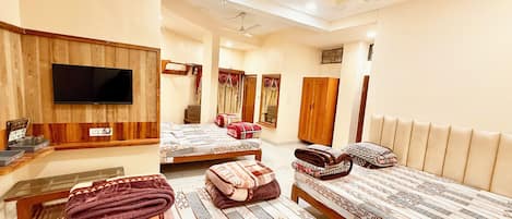 Family Room | Premium bedding, desk, laptop workspace, soundproofing