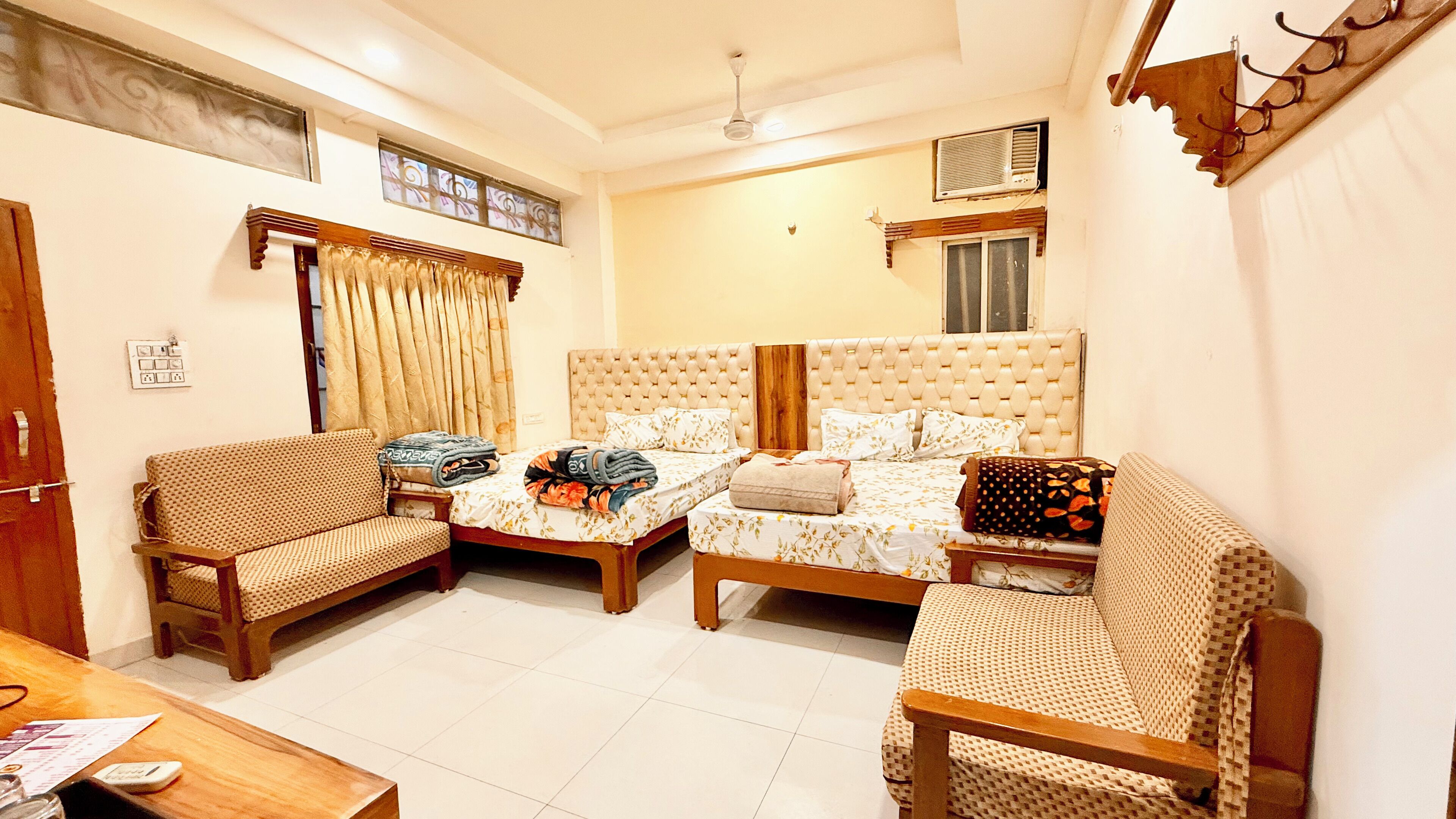 Deluxe Quadruple Room | Premium bedding, desk, laptop workspace, soundproofing