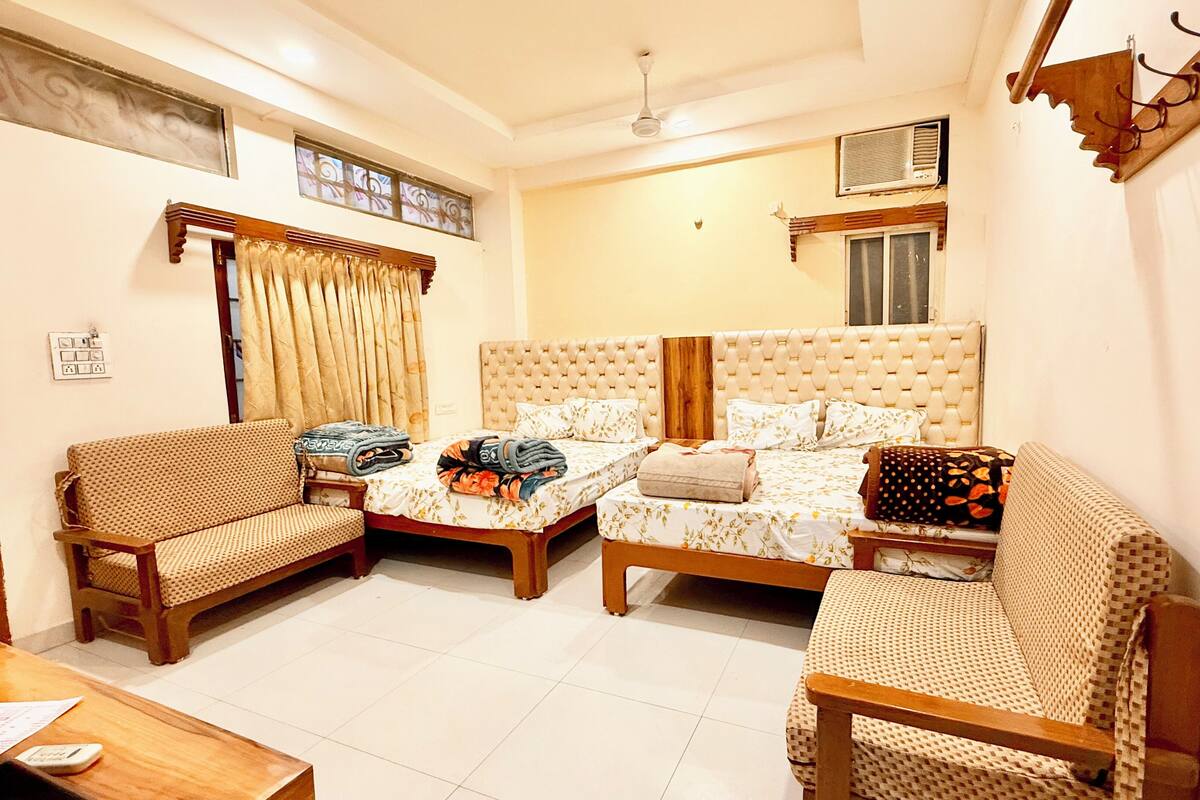 Deluxe Quadruple Room | Premium bedding, desk, laptop workspace, soundproofing