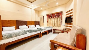 Deluxe Triple Room | Premium bedding, desk, laptop workspace, soundproofing - Hotel P & L near Mahakaleshwar Temple (Ujjain)