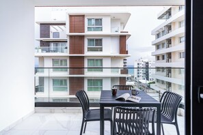 Studio, 1 Double Bed with Sofa bed, Kitchenette, City View | Balcony - Dusk - Studio by Plus 49 in Mackenzie (Larnaca)