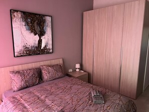 2 dormitorios, tabla de planchar con plancha, wifi gratis y ropa de cama