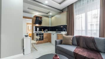 Standard Condo, 1 Bedroom, Non Smoking, Kitchen | Private kitchen | Mini-fridge, oven, stovetop, dishwasher
