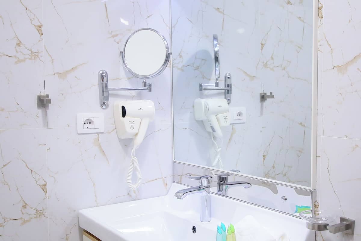 Classic Double Room, Balcony, Beach View | Bathroom | Shower, free toiletries, hair dryer, towels