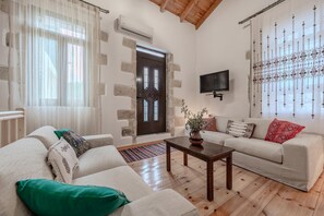 Ferienhaus, 1 Schlafzimmer, Terrasse, Bergblick | Wohnzimmer