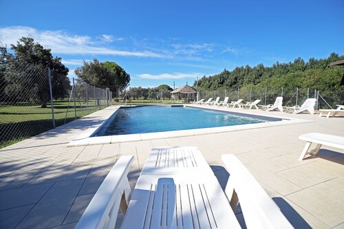 Apartment with pool in a family farmhouse on the Tuscan coast.