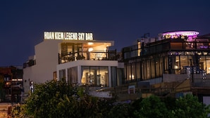 A modern building with a sign reading 'HOAN KIEM LEGEND SKY BAR' at night. - Hoan Kiem Legend Ha Noi Hotel (Hanoi)
