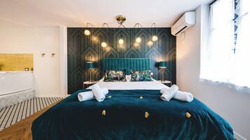 Deluxe Suite | Memory foam beds, iron/ironing board, free WiFi, bed sheets