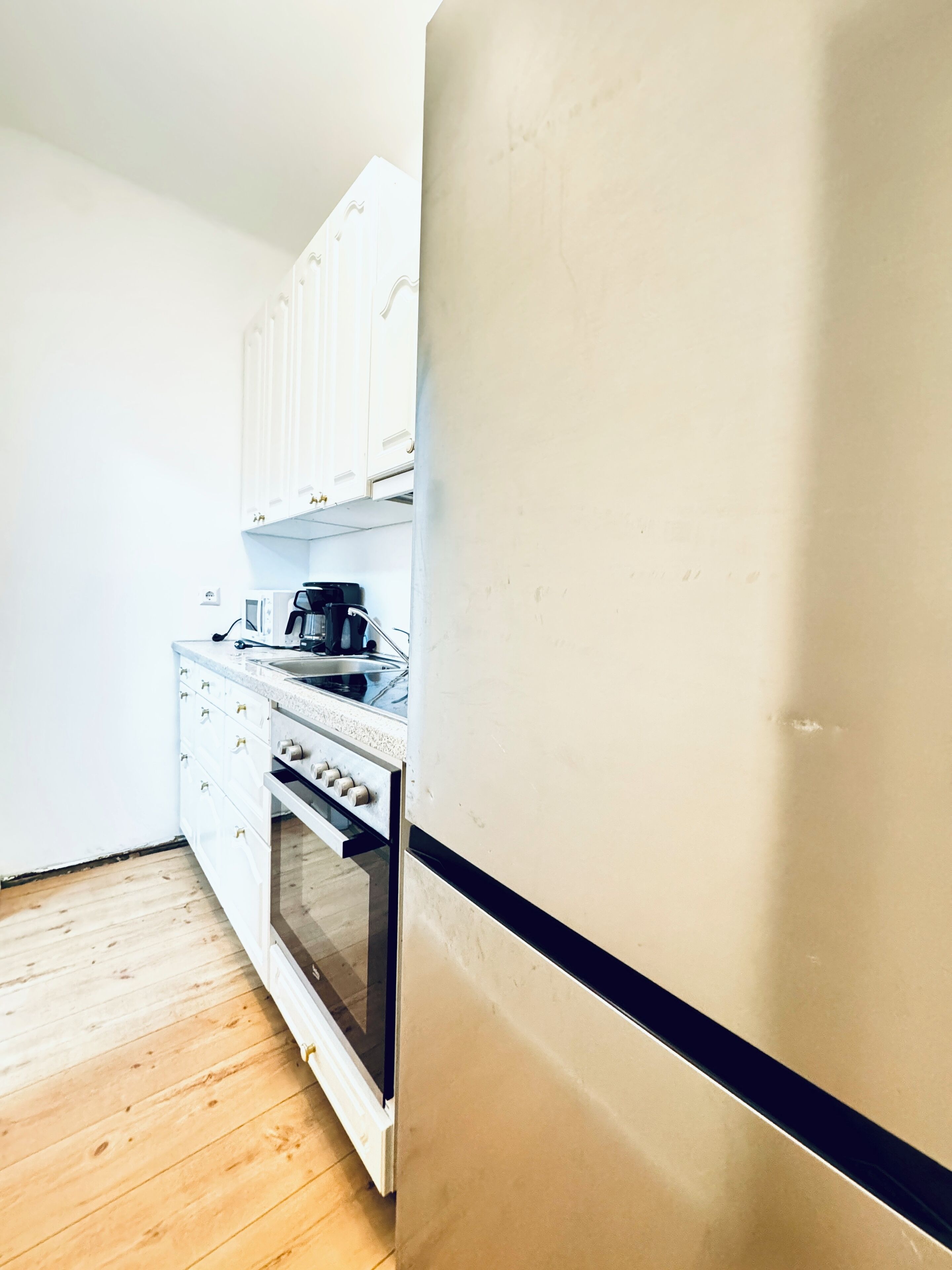 Apartament bàsic | Cuina privada | Frigorífic, microones, forn i placa de cuina 