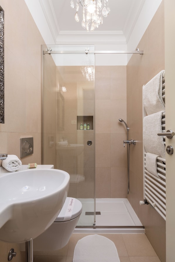 Shower, hair dryer, towels, soap