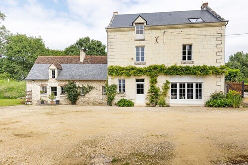 Chambre d’hôtes « Les Prés Hauts » avec jardin commun et Wi-Fi