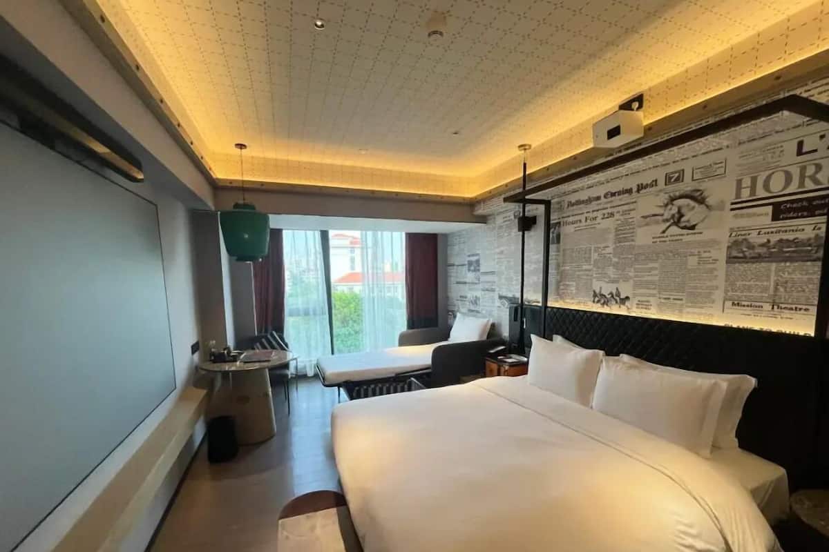 Habitación Deluxe | Minibar, caja fuerte, escritorio y espacio para trabajar con un portátil