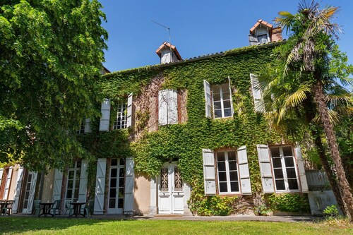 Chambre « Chambre 4 » avec terrasse partagée, jardin commun et Wi-Fi