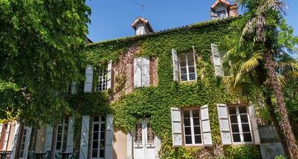 Chambre « Chambre 4 » avec terrasse partagée, jardin commun et Wi-Fi
