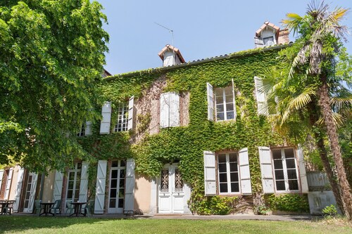 Chambre « Chambre 5 » avec terrasse partagée, jardin partagé et Wi-Fi