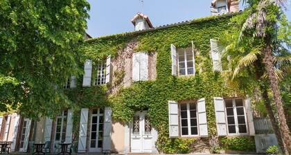 Chambre « Chambre 5 » avec terrasse partagée, jardin partagé et Wi-Fi