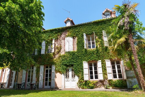 Chambre « Chambre 6 » avec terrasse partagée, jardin commun et Wi-Fi