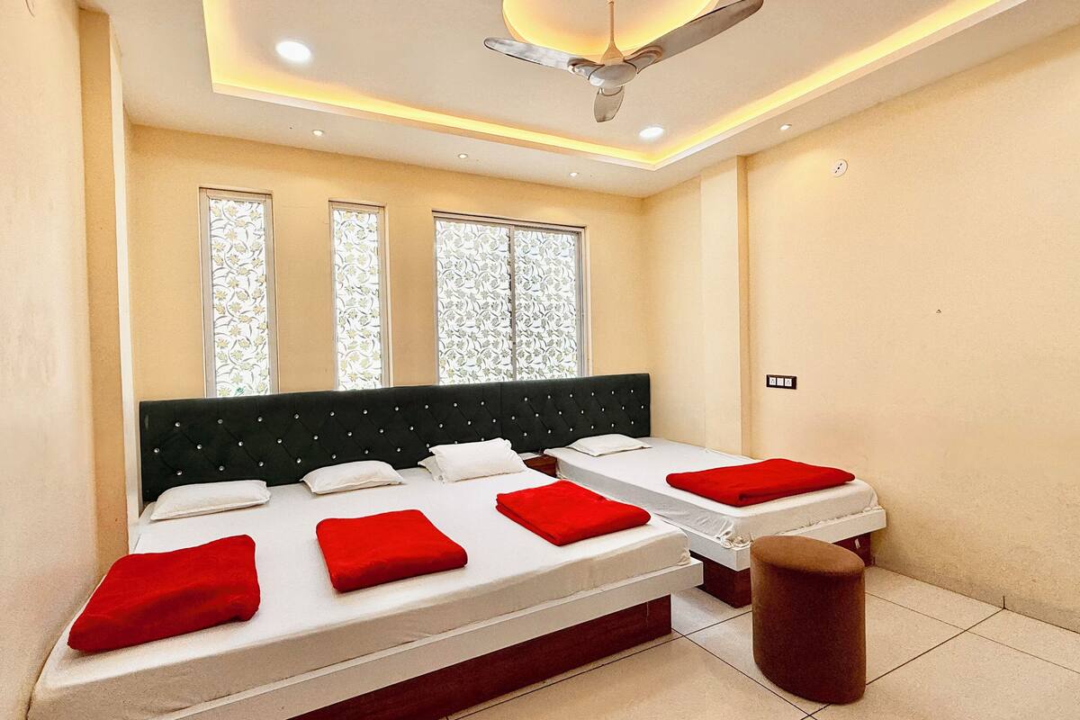 Deluxe Quadruple Room | Premium bedding, desk, laptop workspace, soundproofing