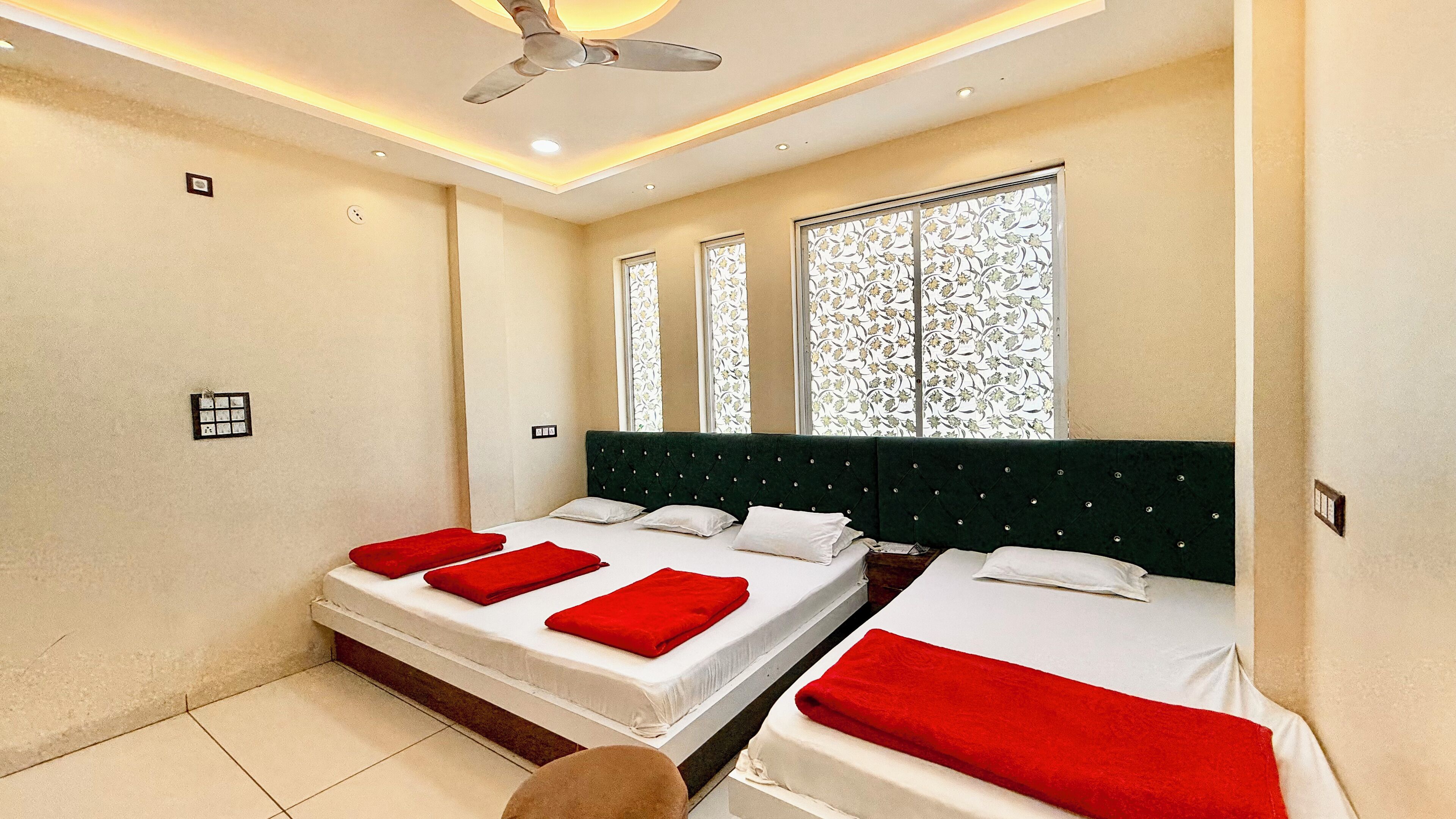 Deluxe Quadruple Room | Premium bedding, desk, laptop workspace, soundproofing