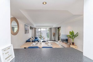 Apartment, 3 Bedrooms, Smoking, Balcony | Living room - Modern Sandton City Central With Balcony (Johannesburg)