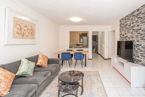 Living room - Sandton City 3 Bedroom Apartment With Balcony (Johannesburg)