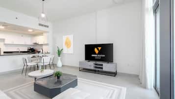 Apartamento, sacada, vista para a cidade | Área de estar