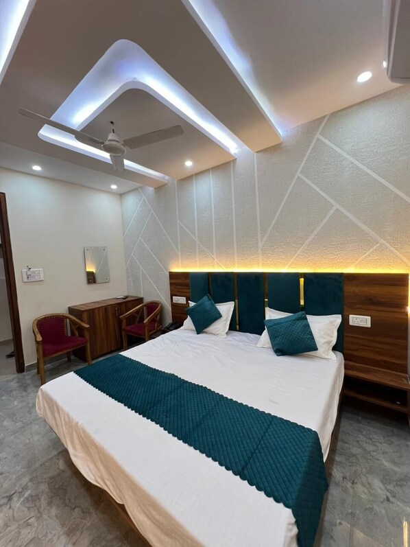 Hypo-allergenic bedding, down comforters, pillowtop beds, desk